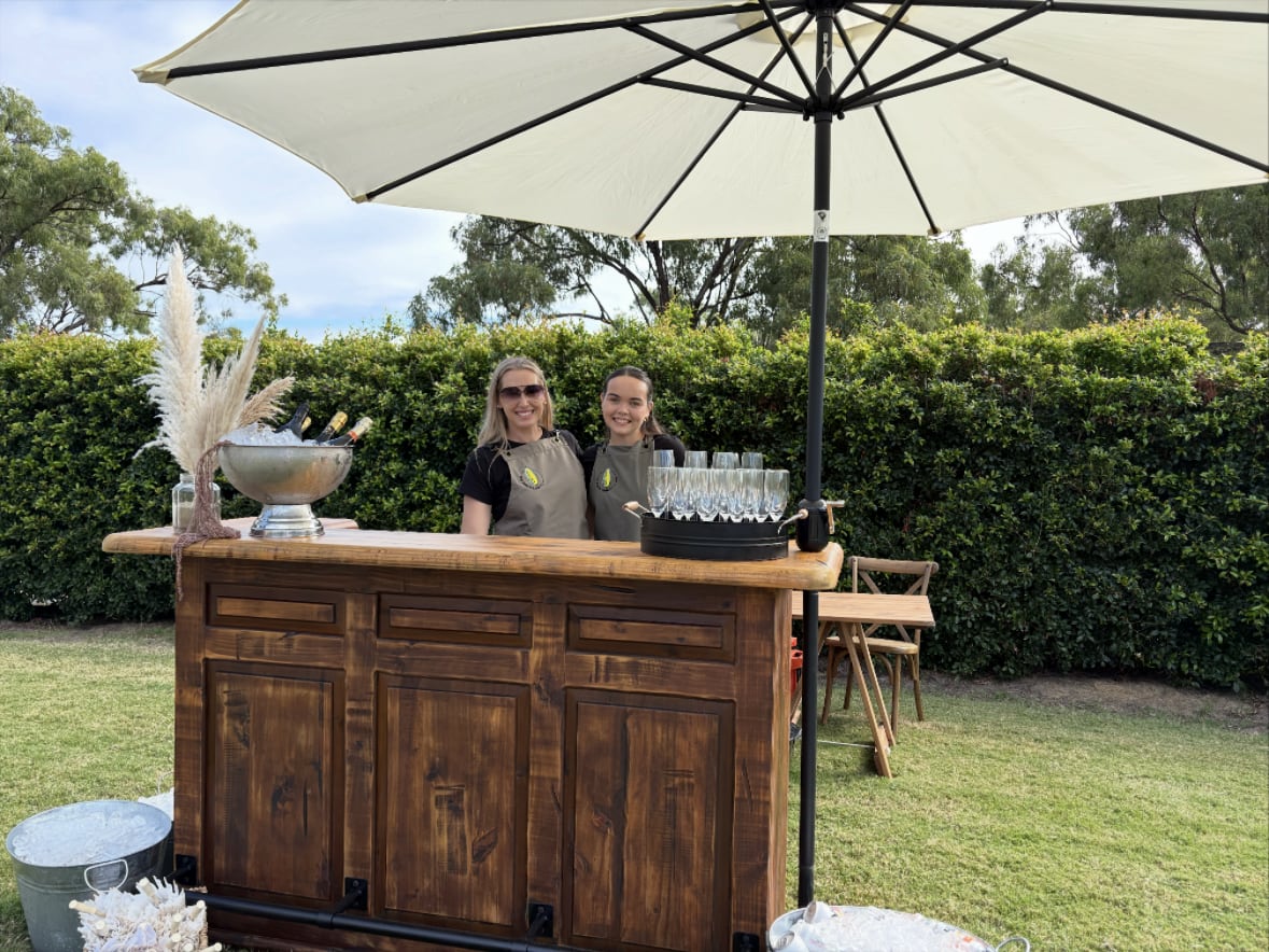 The Salty Lime Co events team at the outdoor bar