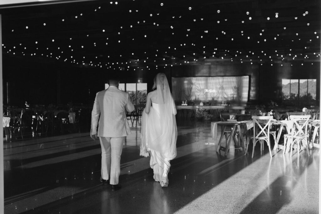 Newlyweds at their evening wedding reception