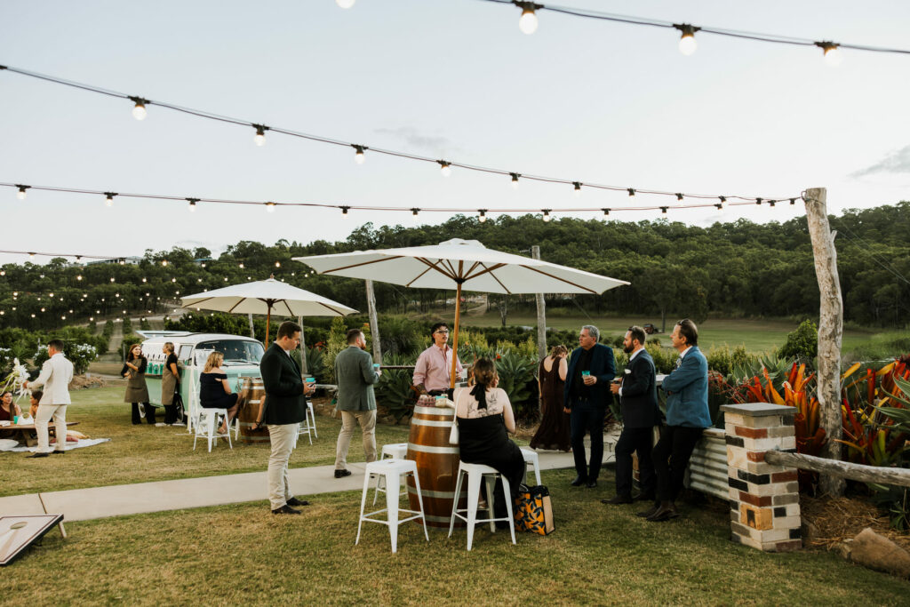 Outdoor wedding reception on the lawn at The Salty Lime Co