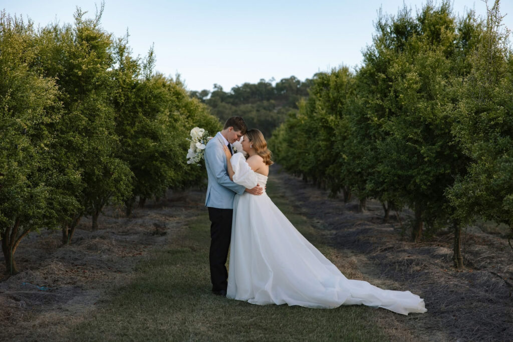 Wedding couple portrait among the gardens