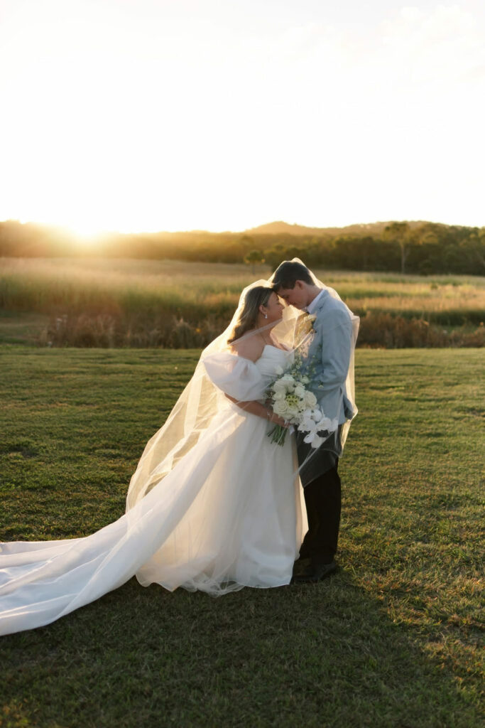 Sunset wedding portrait on the lawn at The Salty Lime Co