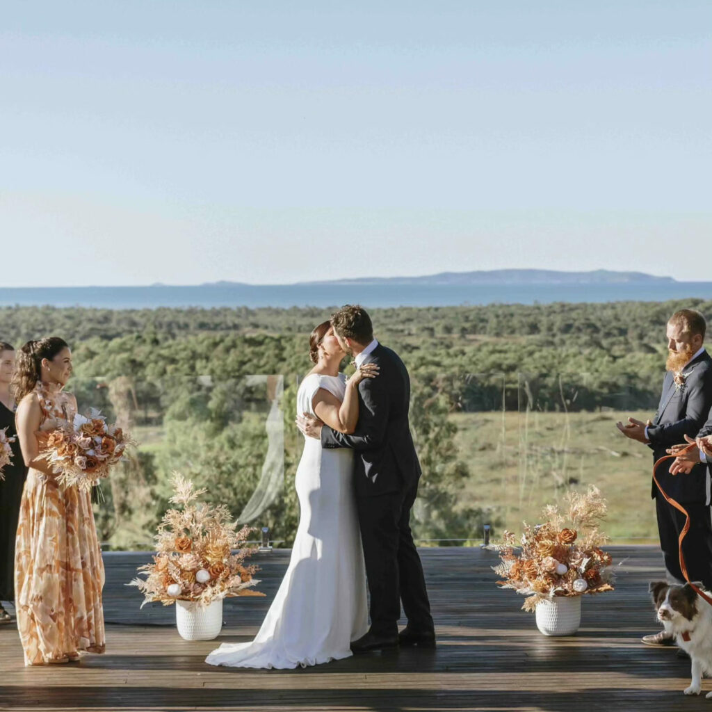 Couple exchanging vows at The Salty Lime Co