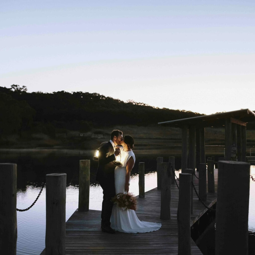 Bride on the lakeside jetty at The Salty Lime Co