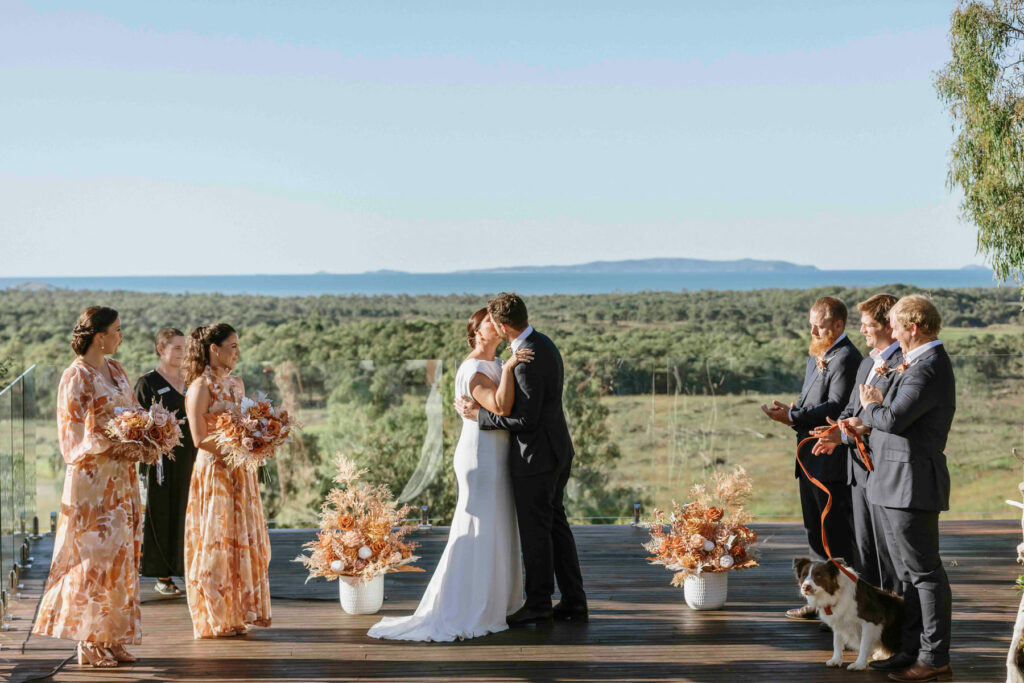 Outdoor wedding ceremony overlooking the lake and mountains