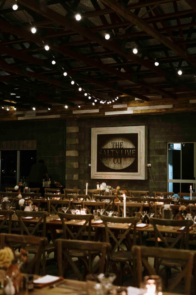 Evening wedding reception in the rustic venue